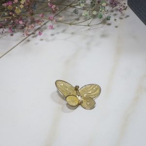 Gold butterfly pin